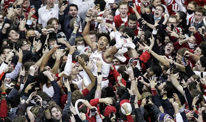 Senior guard Rob Phinisee celebrates on the court with Indiana fans after his game-winning shot beat Purdue on Jan. 20, 2022 in Simon Skjodt Assembly Hall. (Photo by Gracie Farrell/IU Athletics)